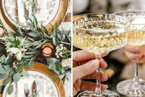 Vacker nyårsdukning med guldiga detaljer, gröna blad och levande ljus. Två glas champagne höjs för en skål.