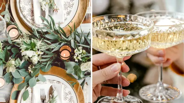 Vacker nyårsdukning med guldiga detaljer, gröna blad och levande ljus. Två glas champagne höjs för en skål.